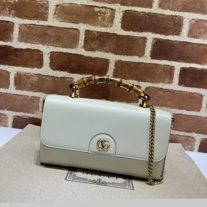 G*u*i top handle bags